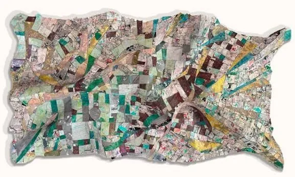 Work by Alfredo Romero made with layers of posters and paper rescued from the street