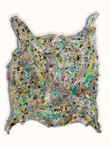 Work by Alfredo Romero made with layers of posters and paper rescued from the street